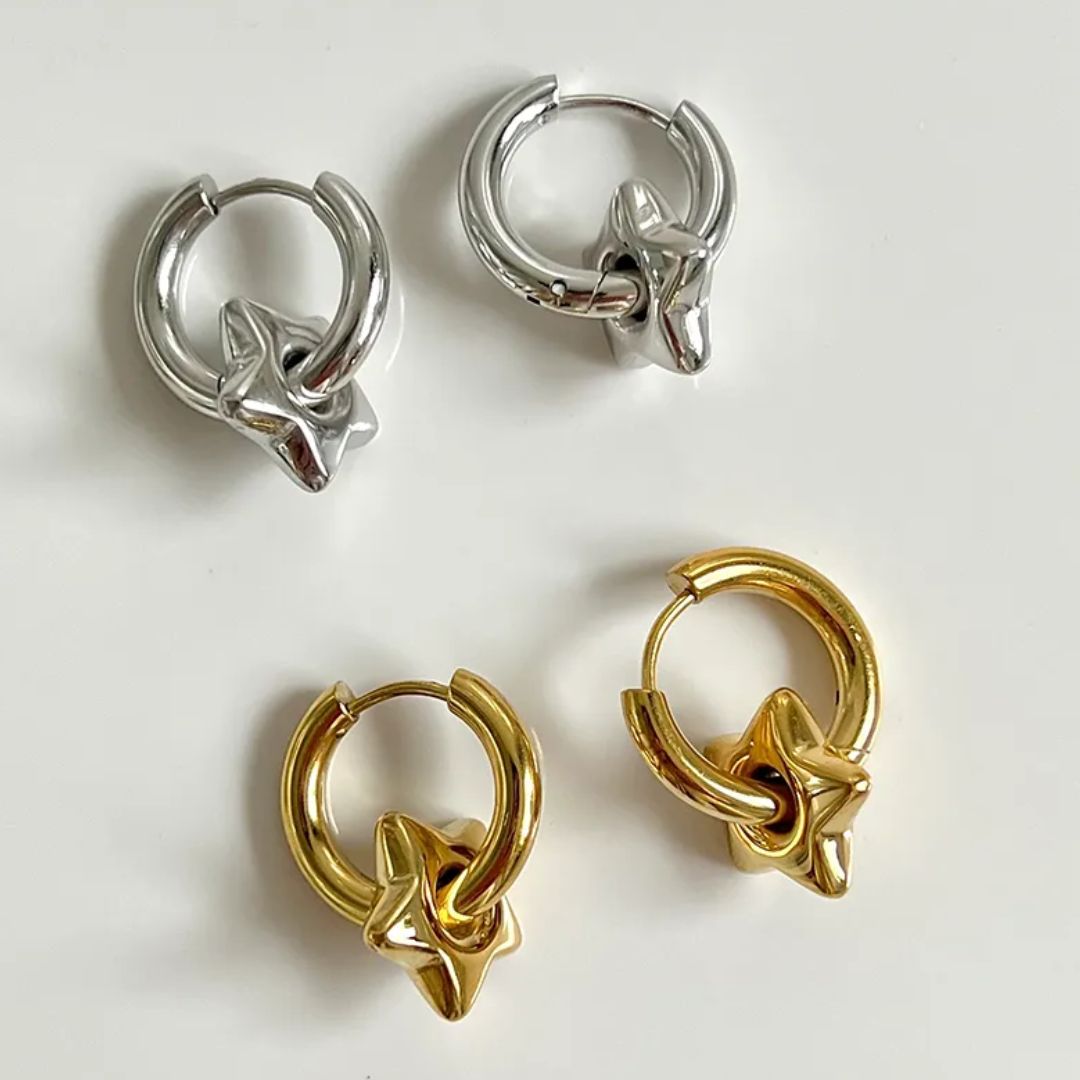 Puffy star earrings in silver