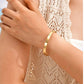 Chloe Bow Bracelet in Gold