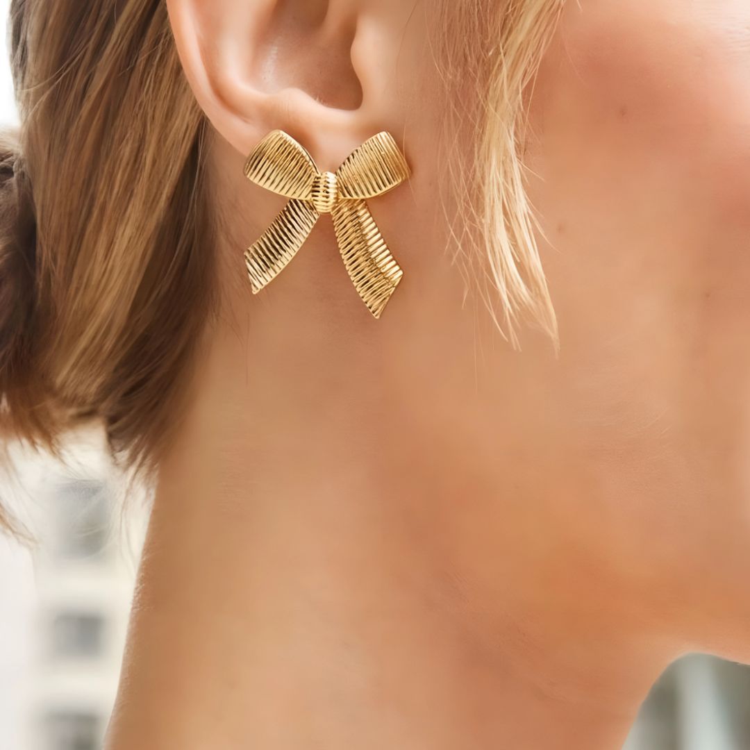 Amy gold bow stud earrings